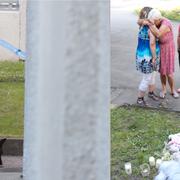 Polis vid brottsplatsen. Grannar hedrar offren.