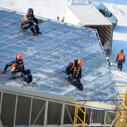 Byggarbetare vid Nizjnij Novgorod-stadion.