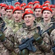 Members of the police forces of Republic of Srpska march during a parade marking the 30th anniversary of the Republic of Srpska in Banja Luka, northern Bosnia, Sunday, Jan. 9, 2022.