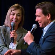 Kim Reynolds och Ron DeSantis.