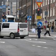 Polis i anslutning till köpcentret. 