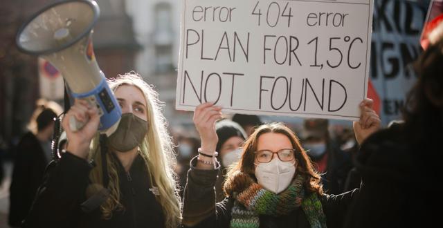 Demonstranter i Schweiz i samband med klimatmötet COP26 förra året.  Michael Buholzer / AP