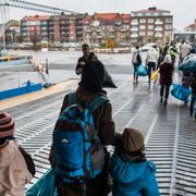 Flyktingar anländer till Trelleborg med  färjan från Rostock.