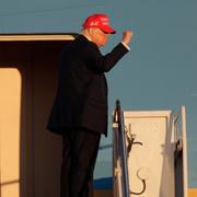 President Donald Trump gestures as he boards Air Force One, Friday, Feb. 28, 2025, at Joint Base Andrews, Md. (AP Photo/Luis M. Alvarez)  MDLA108