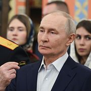 Vladimir Putin vid ett av sina allt mer sällsynta offentliga framträdanden – i samband med julfirandet i januari i år.
