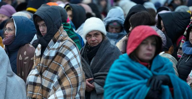 Ukrainska flyktingar vid den polska gränsen.  Markus Schreiber / AP