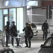 Dödspatrullen pekas de ut som delaktiga i dubbelmordet på Café Mynta den andra december 