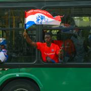 En anhängare till vicepresidenten Mahamudu Bawumia på ett valmöte i huvudstaden Accra.