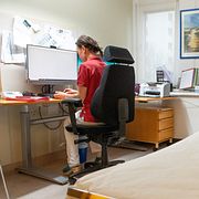 Arkivbild: Läkare sitter i undersökningsrum. 