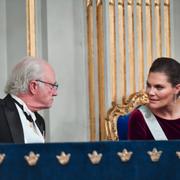 Kung Carl XVI Gustaf och kronprinsessan Victoria under Svenska akademiens årliga högtidssammankomst Börshuset i Gamla stan/Arkivbild