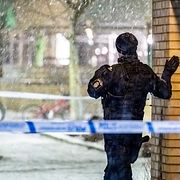Polis på plats efter en detonation vid en port på Bellevuegården i Malmö på onsdagskvällen.