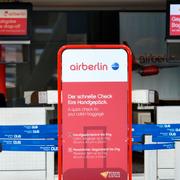 Tom checkin-disk hos Air Berlin.