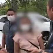 Vy över Bangkok, Thailand. Polisens bild på den misstänkta kvinna. Wiki Commons / POLICETV UCI MEDIA