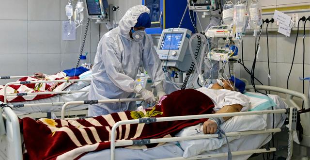 En patient vårdas på sjukhus i Teheran Ali Shirband / TT NYHETSBYRÅN