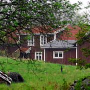 Gammal mangårsbyggnad på Gräskö i Stockholms skärgård. Arkivbild.