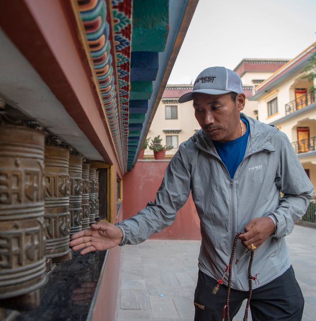 Kami Rita Sherpa, a renowned mountain guide, encouraged his two children to pursue college degrees, which they are now completing. SAUMYA KHANDELWAL / NYT