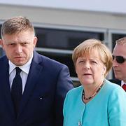 Robert Fico tillsammans med Tysklands förbundskansler Angela Merkel.