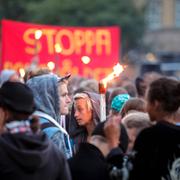 Ung Vänster demonstrerar mot polisvåld med ljusmanifestation framför polishuset vid Davidshalls torg i Malmö i augusti 2014 