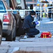 Polisens tekniker efter mordet. 
