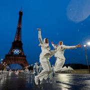 Egyptian athletes leap while participating in the opening ceremony of the 2024 Summer Olympic in Paris.