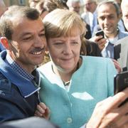 Tysklands förbundskansler Angela Merkel vid flyktingförläggning i Berlin, september 2015.