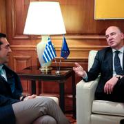 EU:s finanskommissionär Pierre Moscovici i samtal med Greklands premiärminister Alexis Tsipras på tisdagen.