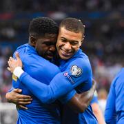 Samuel Umtiti och Kylian Mbappé.