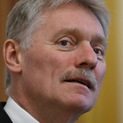 Dmitrij Peskov och en bild från FN:s säkerhetsråd. 