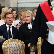 Helena Norlén, statsminister Ulf Kristersson (M) och Birgitta Ed Kristersson inför prinsessan Ines dop i Drottningholms slottskyrka 13 juni 2025.