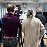 Journalister inför en pressträff. 