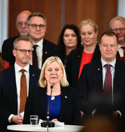 Joakim Bornold och de svenska ministrarna med statsminister Magdalena Andersson i spetsen. 