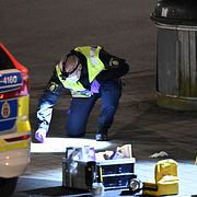 Polisens tekniker på plats efter skjutningen i april förra året.