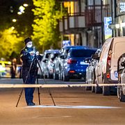 Kriminaltekniker jobbar på mordplatsen