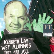 Protesters hold up an effigy of Enron's Kenneth Lay during a march against the World Economic Forum (WEF) February 2, 2002 in New York City.