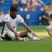 England buades ut av de tillresta supportrarna. 