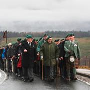 Brittiska veteraner tågar i Spean Bridge i England.