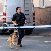 Polis på JH Dahlsgatan i Kristianstad den 12 augusti.