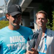 Stefan Edberg bakom sin adept på Australian open 2014.