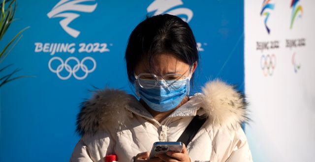 En kvinna i Peking. Mark Schiefelbein / AP