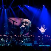 Singer Phil Collins leads Genesis as they play in their "The Last Domino?" tour at the United Center on Monday, Nov. 15, 2021, in Chicago. (AP Photo/Matt Marton)  ILMM102