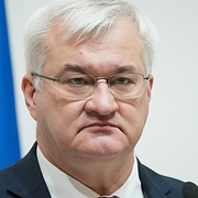 Ukrainas utrikesminister Andrij Sybiha och Rysslands president Vladimir Putin.