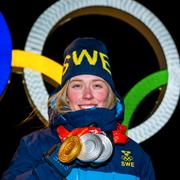 Elvira Öberg med sina tre OS-medaljer