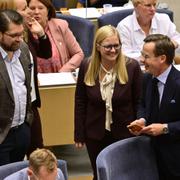 SD:s Jimmie Åkesson och Julia Kronlid tillsammans med Ulf Kristersson (M). 