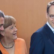 Jens Weidmann med Angela Merkel.