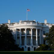 The White House is seen from the motorcade of President-elect Obama after his meeting with President Bush, Monday, Nov. 10, 2008, in Washington. (AP Photo/Charles Dharapak)