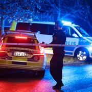 Polis på plats efter skottlossningen. 
