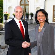 Fredrik Reinfeltd och Condoleezza Rice.