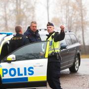 Polis på plats efter mordet i oktober förra året.